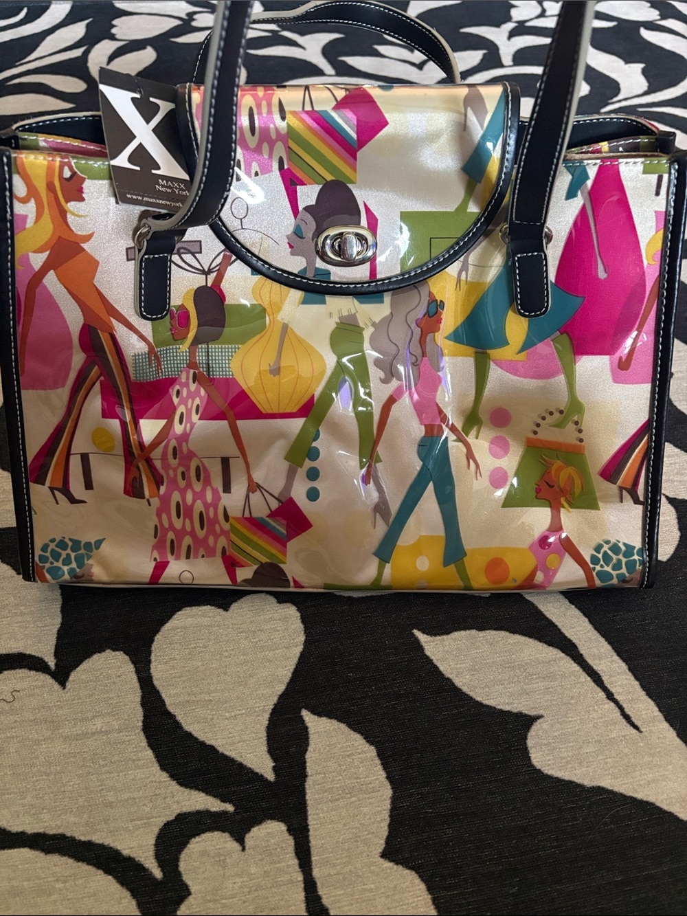 Maxx New York Cream Patent Tote with Pink, Yellow, Green & Blue Graphic Print